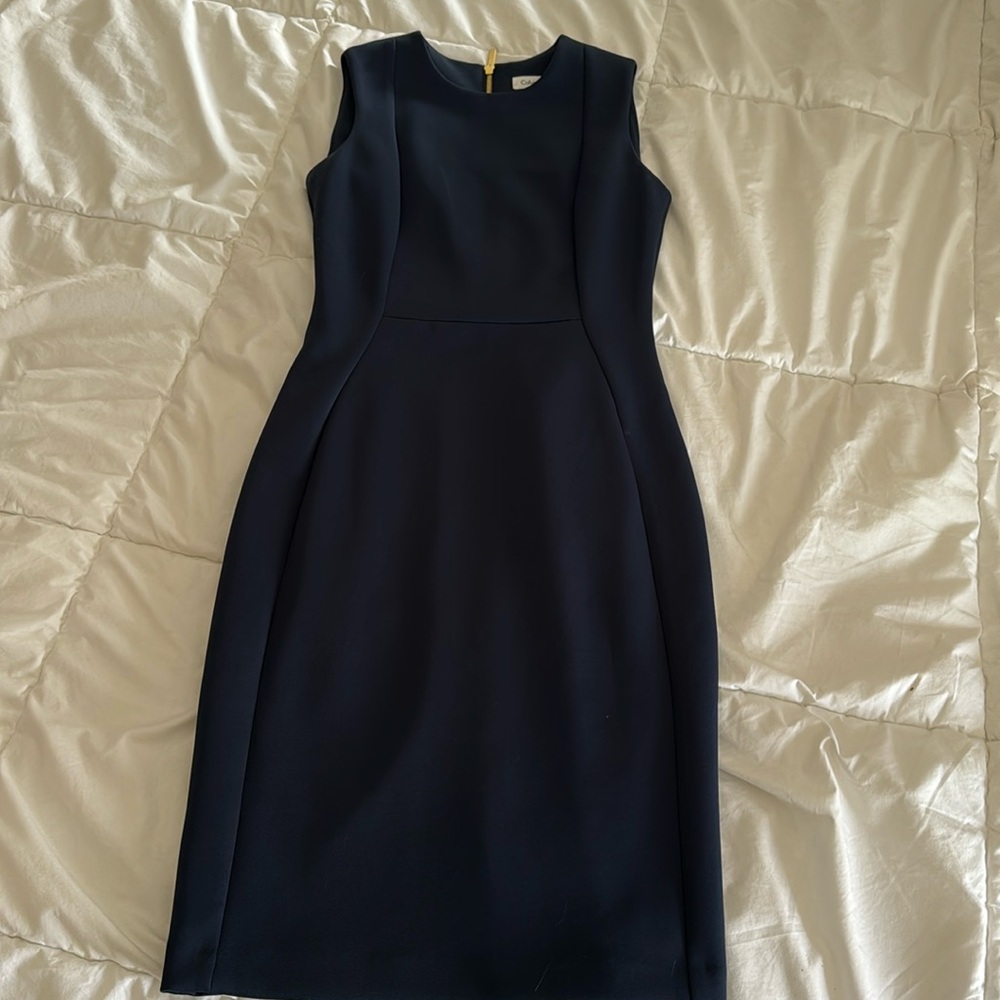 Navy blue sleeveless midi dress with gold back zipper